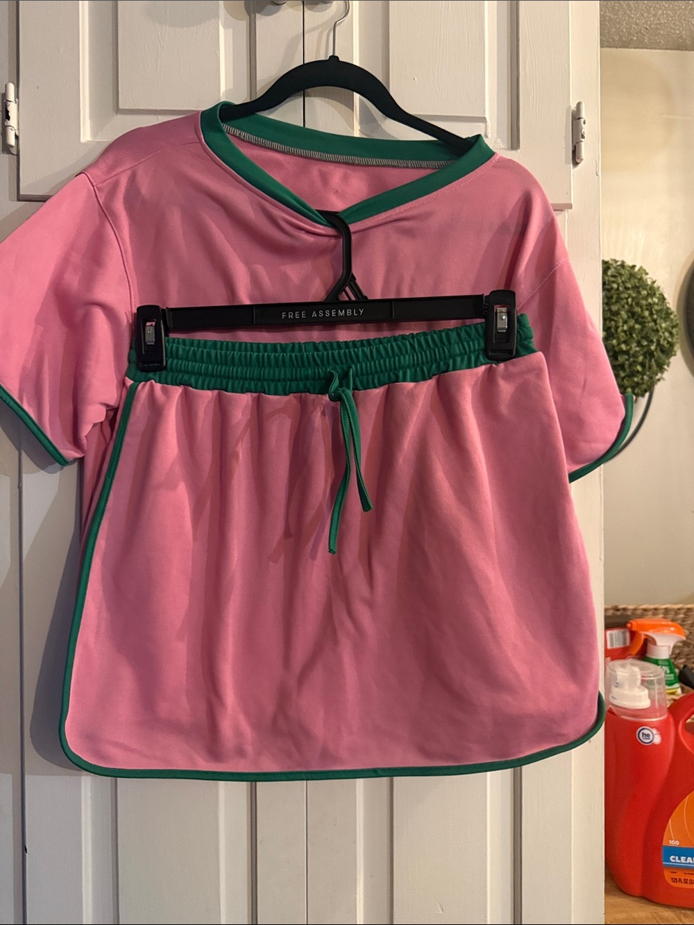 Amazon Pink Top and Skirt Set with Green Trim